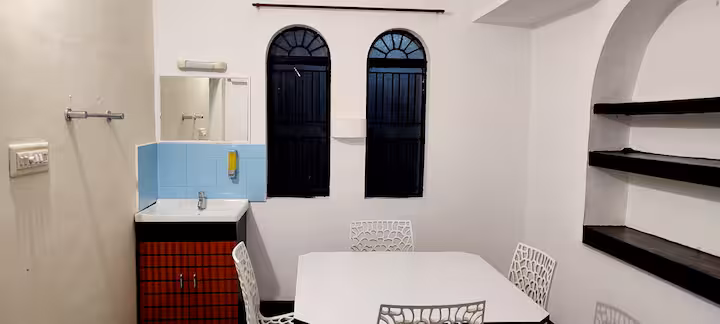 Dining space with arched windows