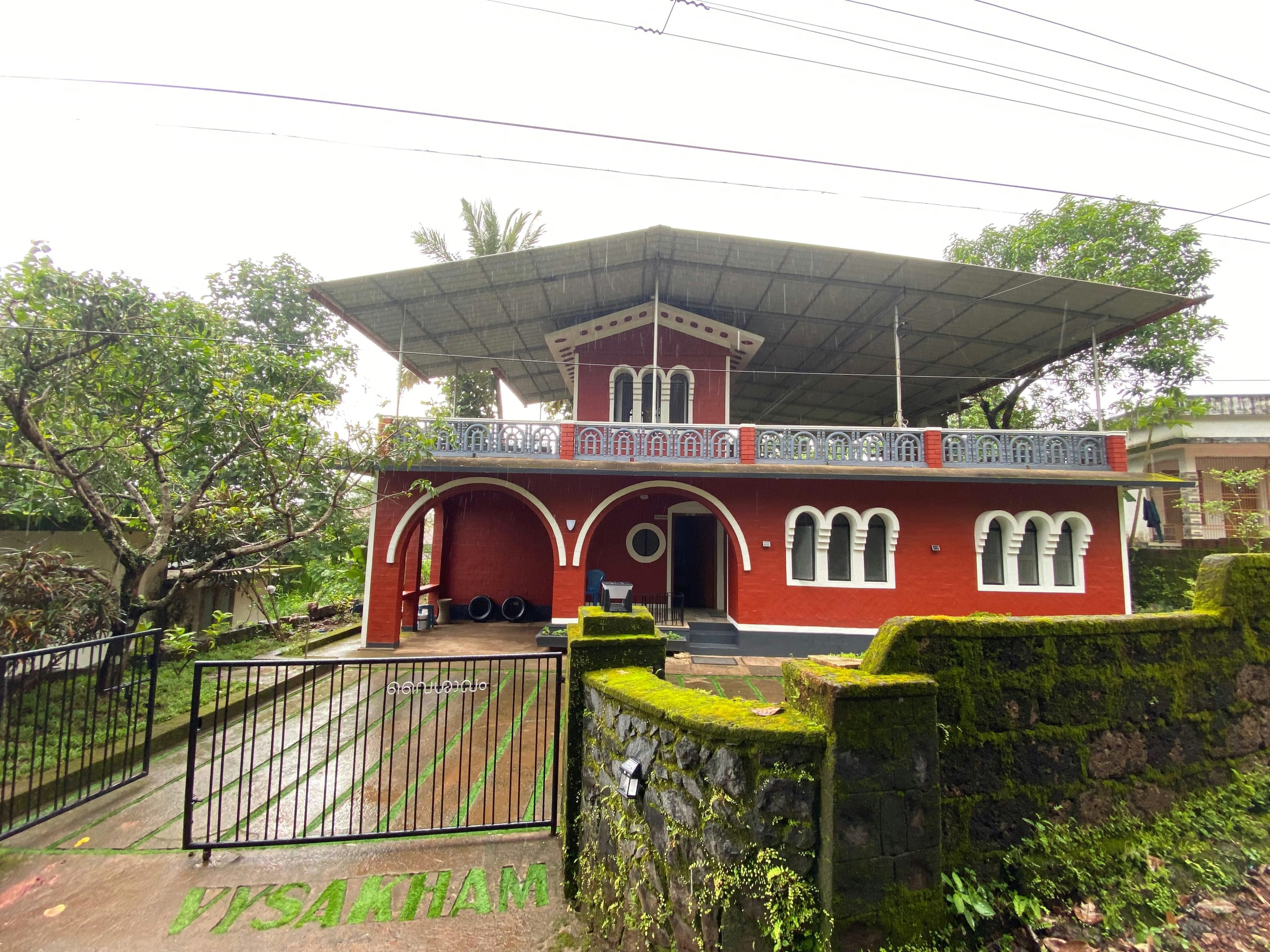 Sunny front courtyard view of Vysakham Heritage